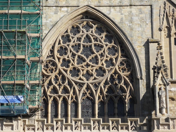 Photo of intricate gothic cathedral window architecture