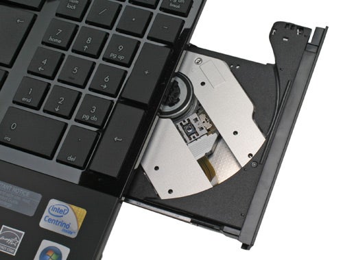 HP ProBook 4510s with open DVD drive showing disc compartment.