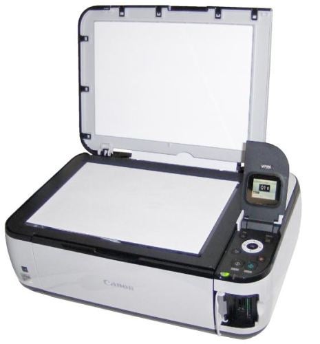 Canon PIXMA MP490 inkjet multifunction printer open for scanning.