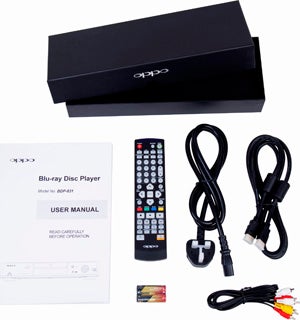 OPPO Blu-ray player, remote, cables, and user manual.