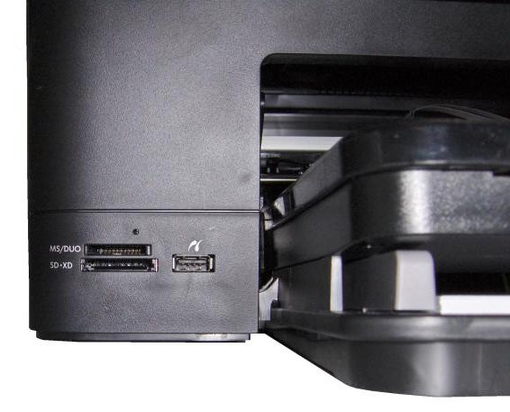 Close-up of HP Photosmart Premium C309g memory card slots.