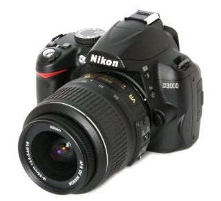 Nikon D3000 DSLR camera with standard zoom lens.