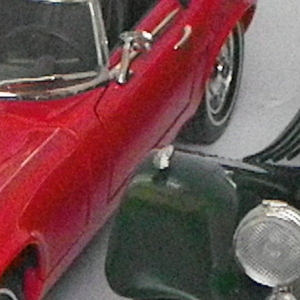 photo of a red toy car taken with Pentax Optio P80.