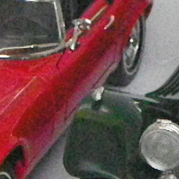 image of a red die-cast model car