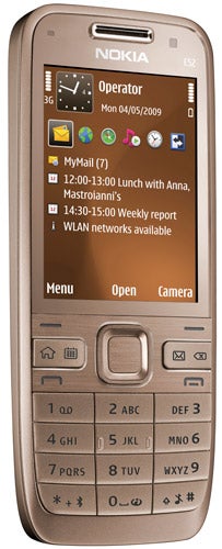 Nokia E52 mobile phone with display on and buttons visible.