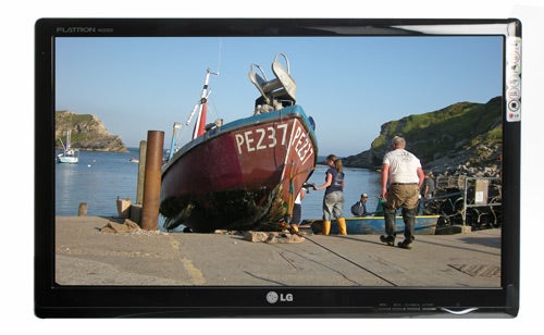 LG Flatron W2230S monitor displaying a boat scene.