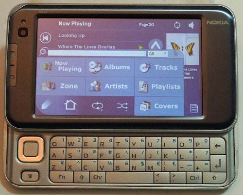 Nokia smartphone displaying music player interface.