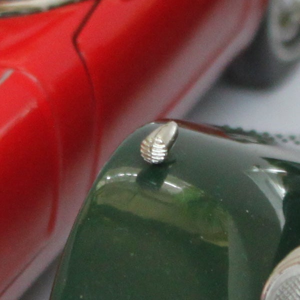 Close-up of a camera's mode dial knob.