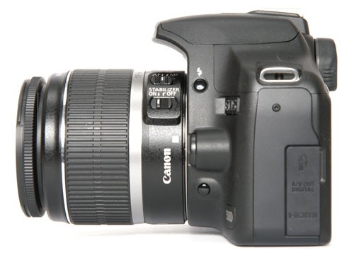 Canon EOS 500D Digital SLR camera with lens attached.