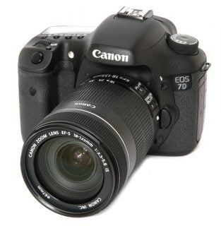 Canon EOS 7D DSLR camera with zoom lens.