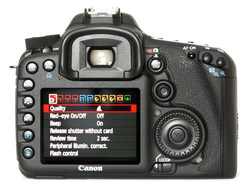 Canon EOS 7D DSLR camera back view with menu displayed.