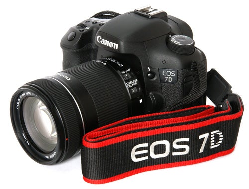 Canon EOS 7D DSLR camera with lens and strap.