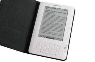 Amazon Kindle International Edition with open cover displaying text.