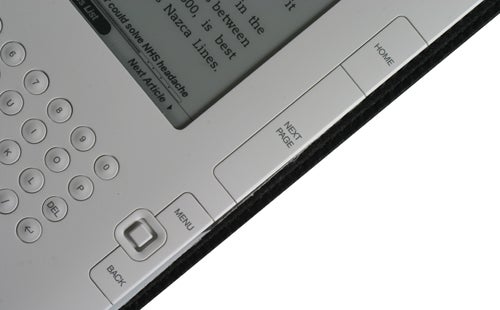 Close-up of Amazon Kindle International Edition buttons and screen.