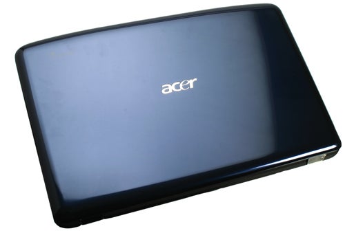 Acer Aspire 5738PG laptop closed lid view on white background.