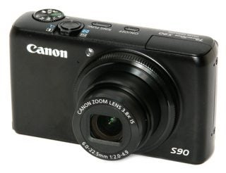 Canon PowerShot S90 digital camera on white background.