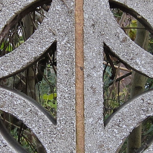 Close-up of frost on outdoor metal decoration.