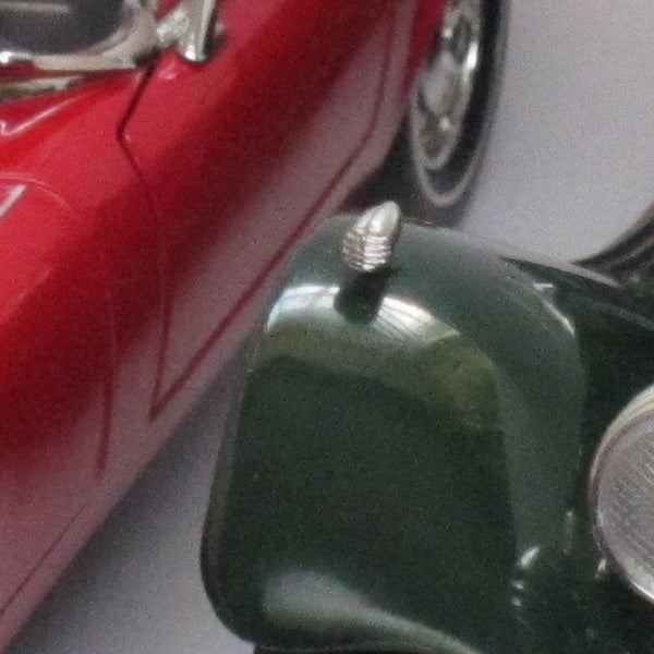 Close-up photo of toy cars showing camera's depth of field.