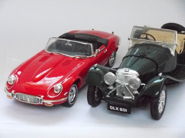 Toy model cars photographed with a Samsung WB550 camera.
