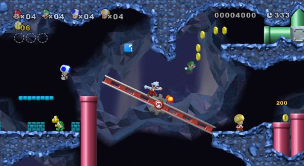 Gameplay screen from New Super Mario Bros Wii with four players.