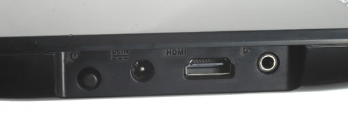 Close-up of Asus device showing HDMI port and buttons.