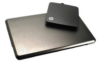 HP Envy 15-1060ea laptop with external hard drive on top
