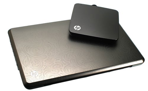 HP Envy 15-1060ea laptop with external hard drive on top