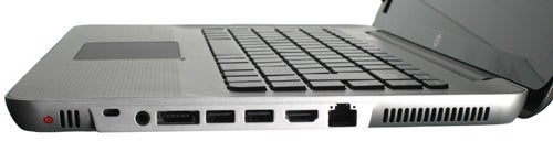 HP Envy 15-1060ea laptop showing keyboard and side ports.