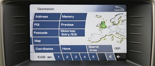 Jaguar XKR Coupe's navigation system display with map and menu.