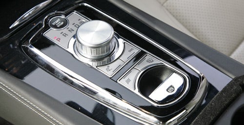 Jaguar XKR Coupe's gear shift and driving mode controls.