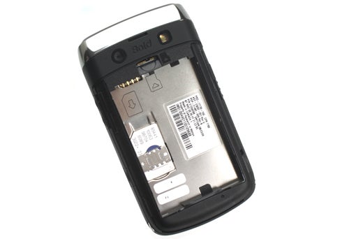 BlackBerry Bold 9700 smartphone with back cover removed.