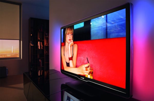 Philips 47PFL9664 LCD TV displaying vibrant image in dim room.
