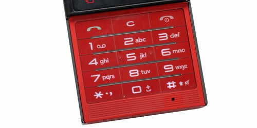 LG Chocolate BL20 slider phone with numeric keypad visible.