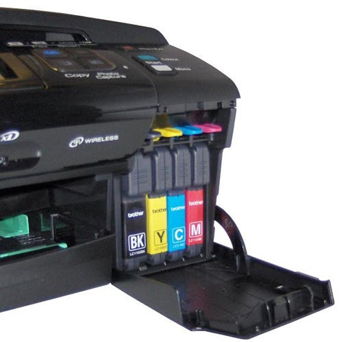 Brother MFC-795CW printer showing its ink cartridges.