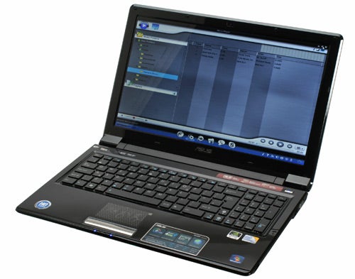 Asus UL50Vg laptop with screen displaying graphics.