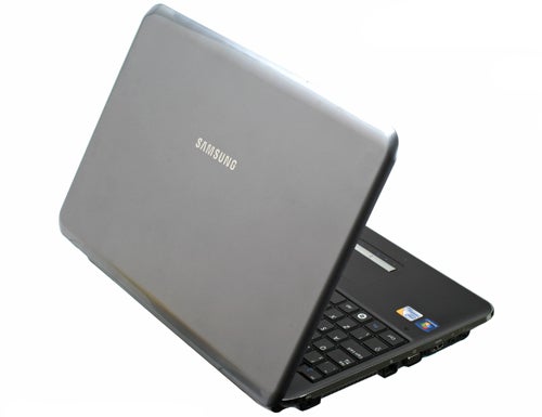 Samsung X520 laptop with open lid on white background.