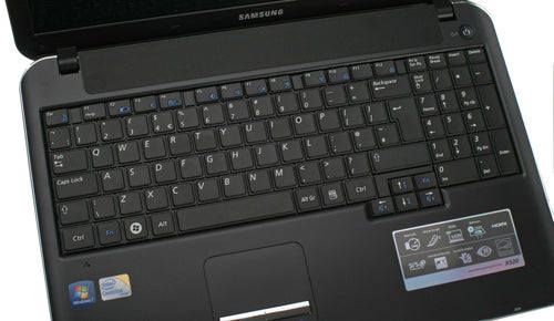 Close-up of a Samsung X520 laptop keyboard and touchpad.