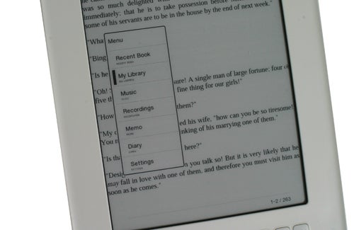 iRiver Story eBook Reader displaying a text passage and menu options.