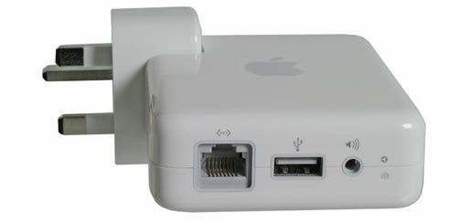 Apple AirPort Express Wi-Fi router with ports and plug.
