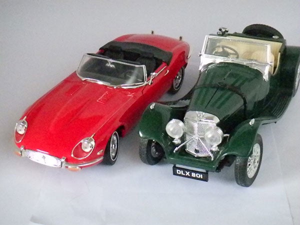 Toy car models captured by Nikon camera.
