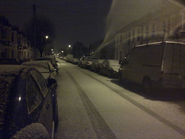 Nokia X6 camera sample of snowy street at night.