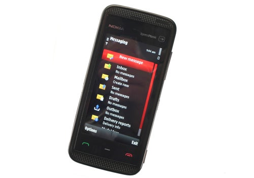 Nokia 5530 XpressMusic smartphone displaying messaging menu.