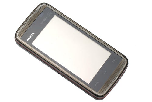Nokia 5530 XpressMusic smartphone on white background.