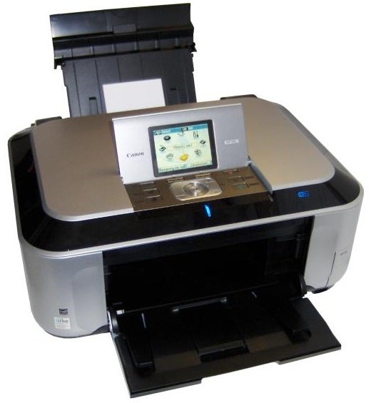 Canon PIXMA MP990 all-in-one inkjet printer with open tray.