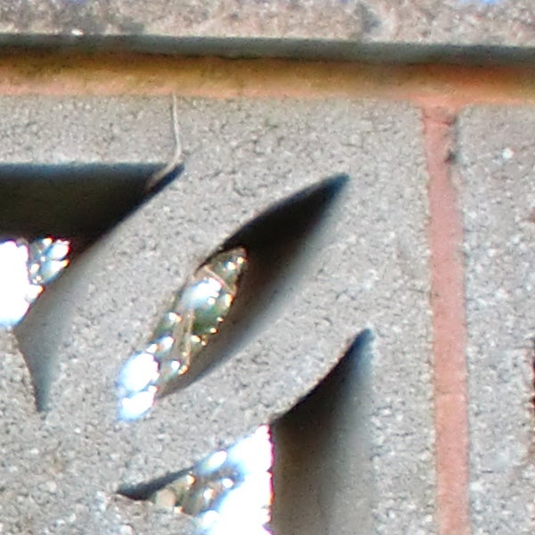 Close-up of a textured surface with light reflections