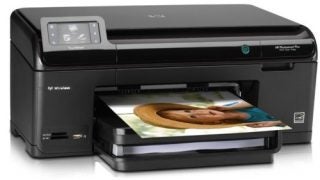 HP Photosmart Plus B209a All-in-One Printer printing a photo.