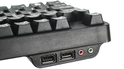 Close-up of SteelSeries 7G keyboard with USB and audio ports.
