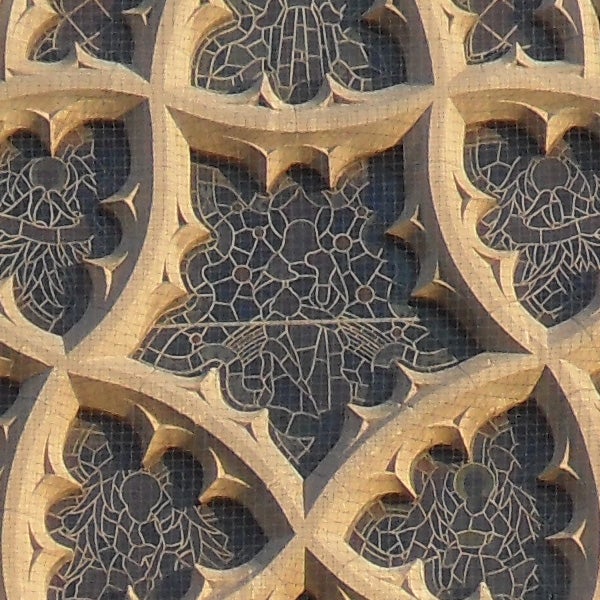 Intricate gothic window architecture design.