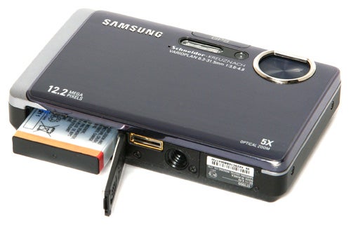 Samsung ST1000 digital camera with open battery compartment