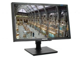 Samsung SyncMaster F2080 LCD monitor displaying an interior scene.